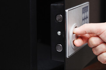 man hand opened a safe, close up