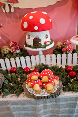 sweet muffins cookies on buffet table