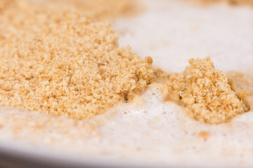 Grounded biscuts with milk close up macro