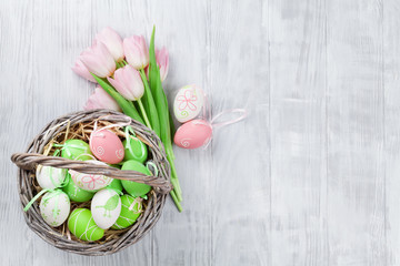 Easter eggs and pink tulips