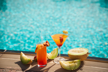 Cold cocktail near the pool in summer time