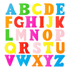 Colorful wooden alphabet letters on a white background