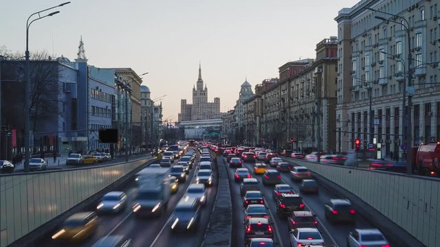 Moscow traffic along Sadovoe Ring road in Moscow. Traffic jam in Moscow. Time lapse at sunset. Establishing shot.