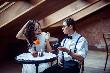 Romantic couple in love bonding in cafe