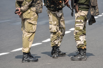 Security men with assault rifle