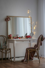 Cosmetics on table in room interior