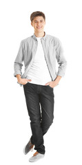 Teenager in casual clothes on white background