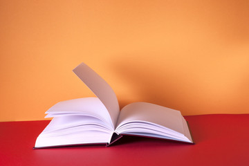 Open book on light table. Back to school. Copy space.