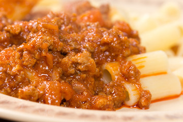 Pork and beef minced meat with tomato sauce and macaroni