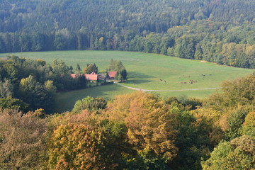 View on fields, villages and farms from Festung Konigstein fortress, Saxon Switzerland, Bavaria, Germany. Famous tourist and travel routes. Natural lighting.