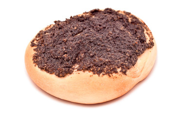 Baked cake with poppy isolated on white