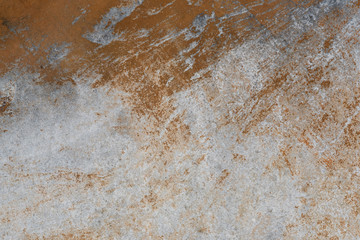 Detail of the side wall of the old rural house, covered with sheets of fiberboard, background