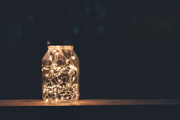 Lights in old retro style lantern © Nickolay Khoroshkov