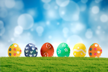 Colorful Easter eggs on grass