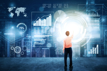 Entrepreneur pressing button on digital screen