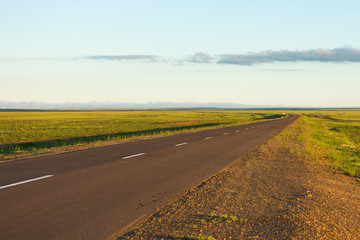 Asphalt road with sunset nature landscape background
