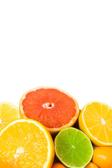 Sliced citrus fruit on the white isolated background