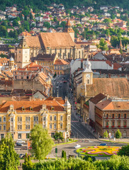 Fototapeta na wymiar Aerial view over traditional church architecture of Brasov, city of Transylvania region, Romania