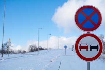 No parking sign on a snow covered mountain.Winter landscape on mountain.