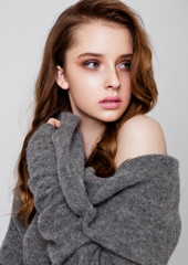 Young beautiful fashion model wearing knitwear