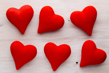 Red hearts the gray background. Valentine Day background.