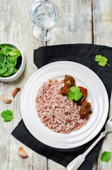 Beef slow cooker with red and white rice and greens