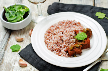 Beef slow cooker with red and white rice and greens