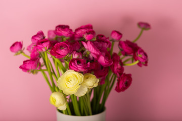 Beautiful bouquet of ranunculuses in a vase