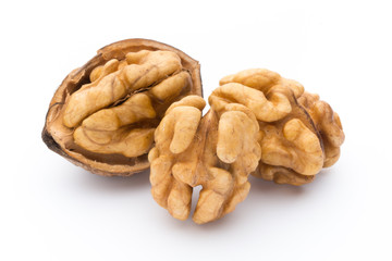 Walnut and walnut kernel isolated on the white background.