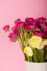 Beautiful bouquet of ranunculuses in a vase
