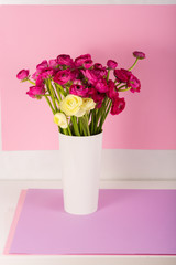 Beautiful bouquet of ranunculuses in a vase