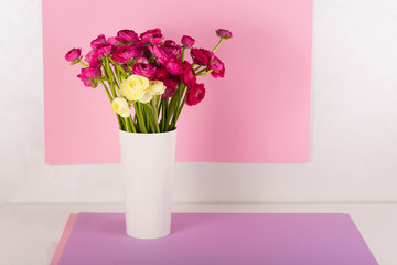 Beautiful bouquet of ranunculuses in a vase