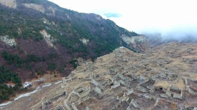 Aerial video old destroyed village in the mountains