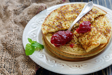 Delicious pancakes with berry jam.