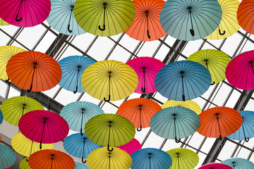 Fototapeta na wymiar Umbrellas background falling from the sky