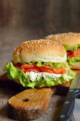 Healthy burger with salted salmon and cream cheese.