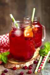Iced cranberry tea with orange.