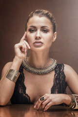 Obraz premium Portrait of sexy woman in necklace.