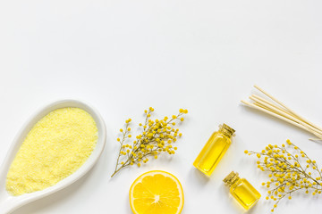 Yellow cosmetic set for body care on white background top view