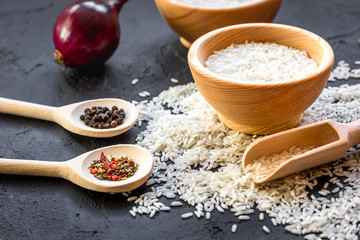 ingredients for paella on dark background
