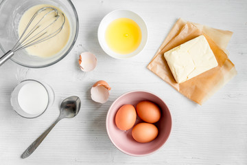 cooking pancake on white background top view ingredients for making