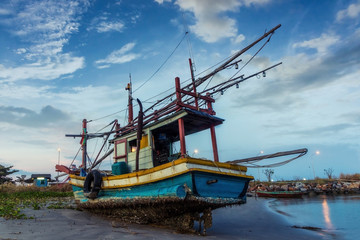 Fishing boat at beach on summer season
