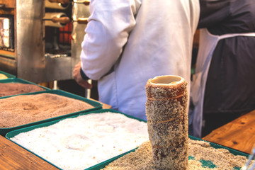 Chimney cake or kurtos kalacs on the stand 