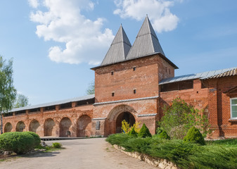 Fototapeta premium Old fortress sunny spring day. Towers and walls of the Kremlin in Zaraysk in Moscow region