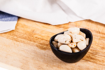 Garlic cloves on wooden table