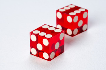 Two red dices, casino isolated on white background