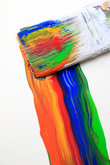 Colorful paint strokes from a paint brush.