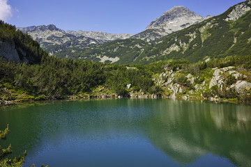 Fototapeta na wymiar Amazing Landscape with The Eye Lake and Muratov Peak, Pirin Mountain, Bulgaria