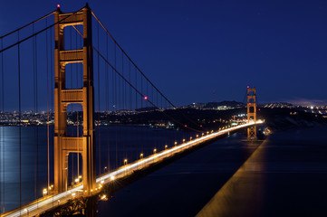 Fototapeta na wymiar SAN FRANCISCO, CA - AUGUST 4, 2009: Golden Gate Bridge shines at night.