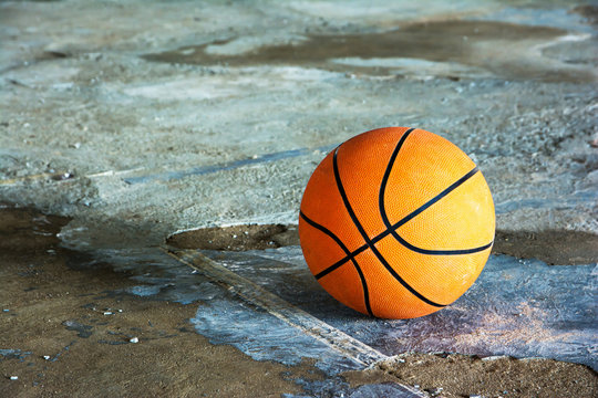 Basketball on Court Floor close up.Basketball ball on concrete floor stadium